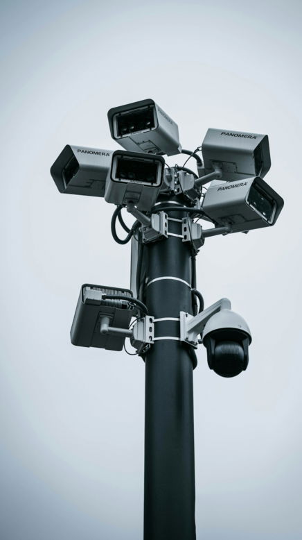 black and gray camera stand